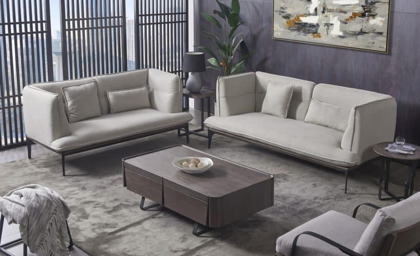 sleek living room with greys and beiges in carpet and couches